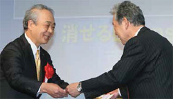 President Suzuki (Left at that time) receiving award